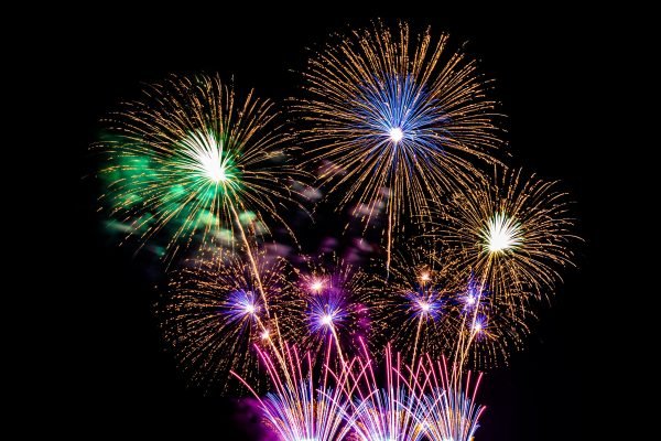 Abstract colorful firework display for celebration anniversary background